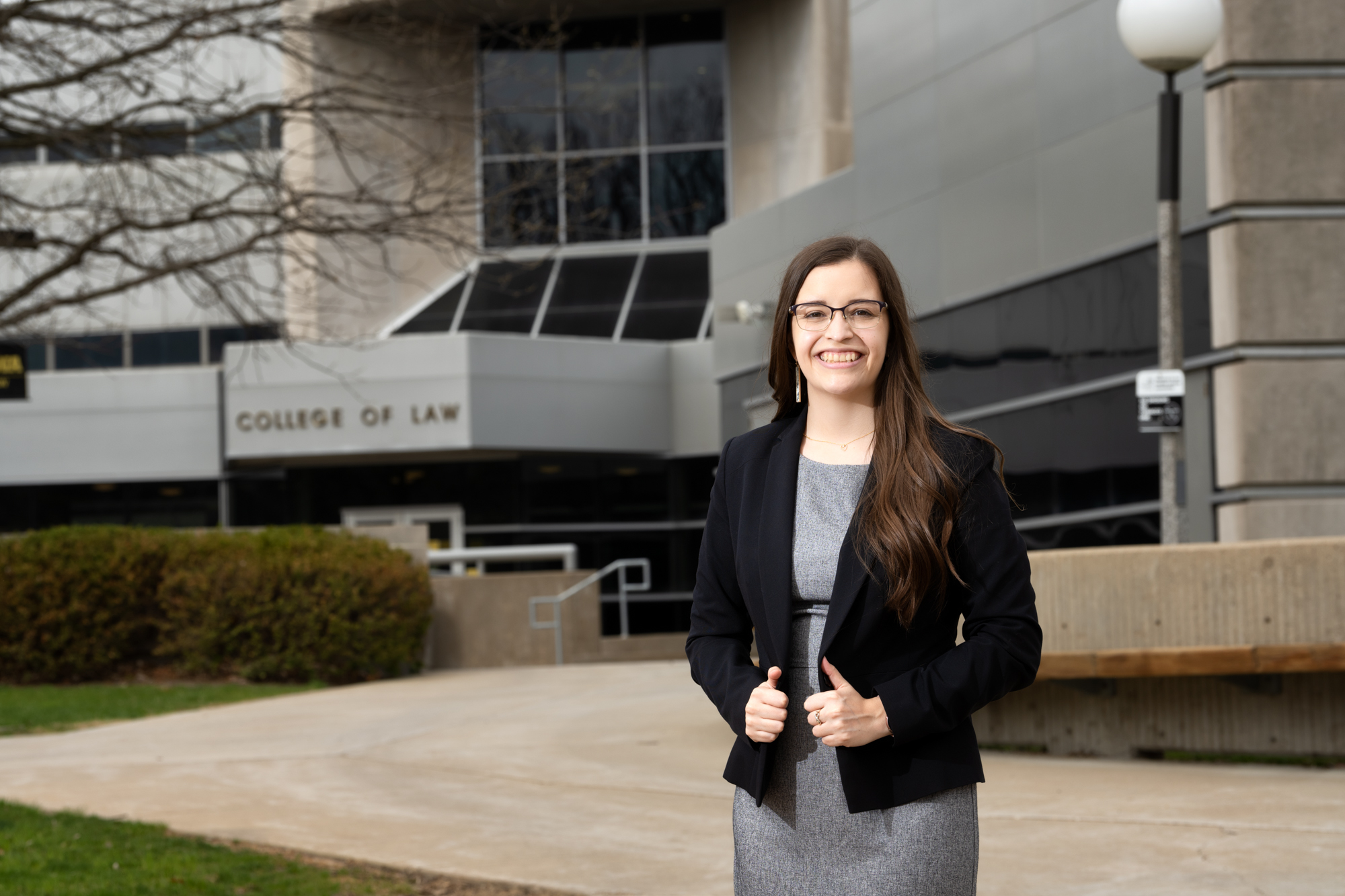 College of Law Student, Kayla Boyd poses in a business suit