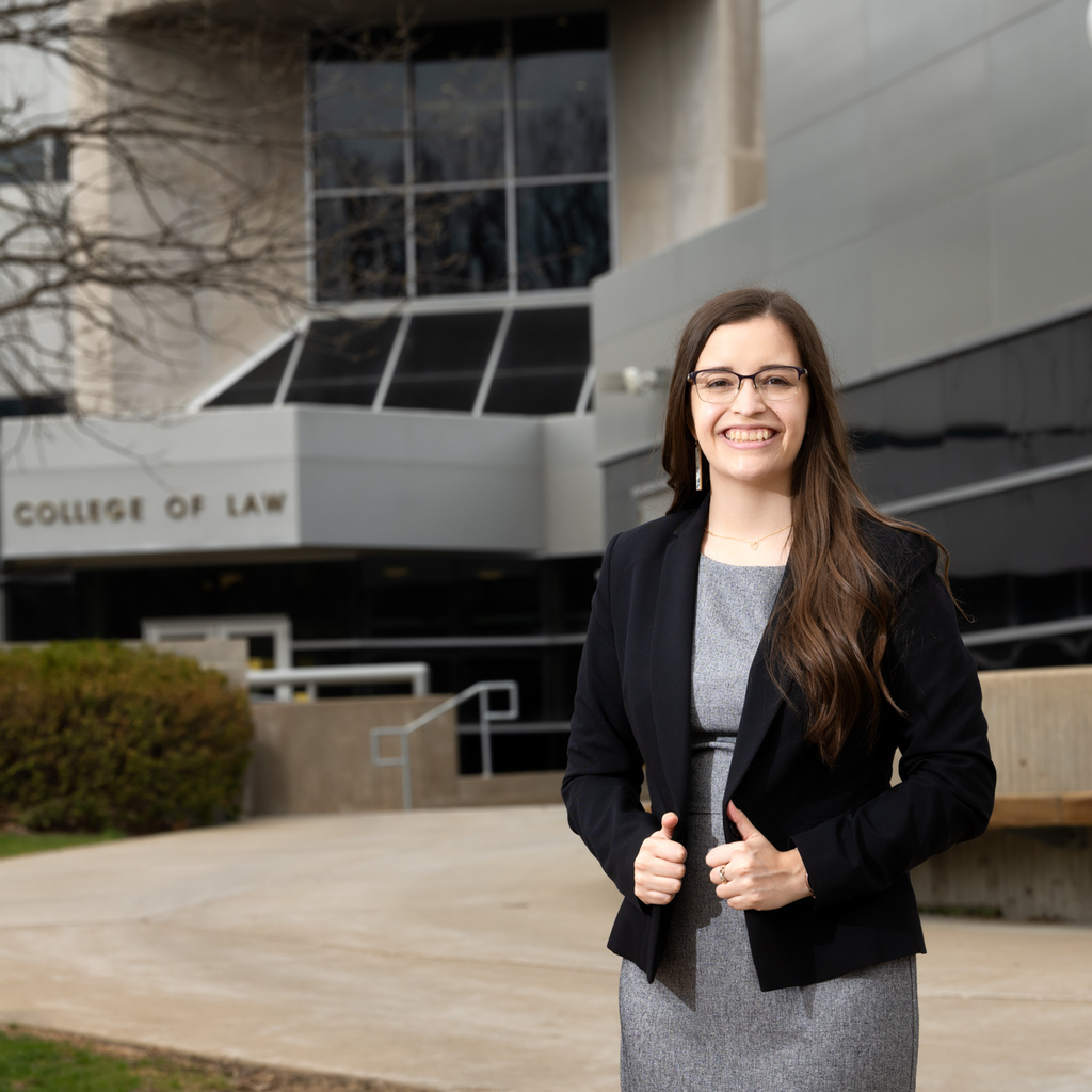 College of Law Student, Kayla Boyd poses in a business suit