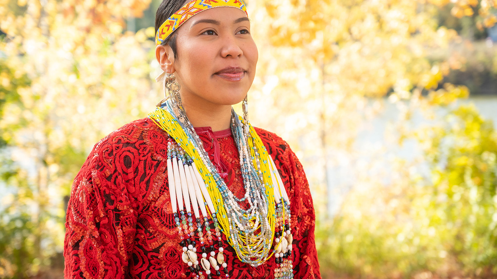 Queta Wanatee-Diego stands proudly in her Meskwaki Native regalia